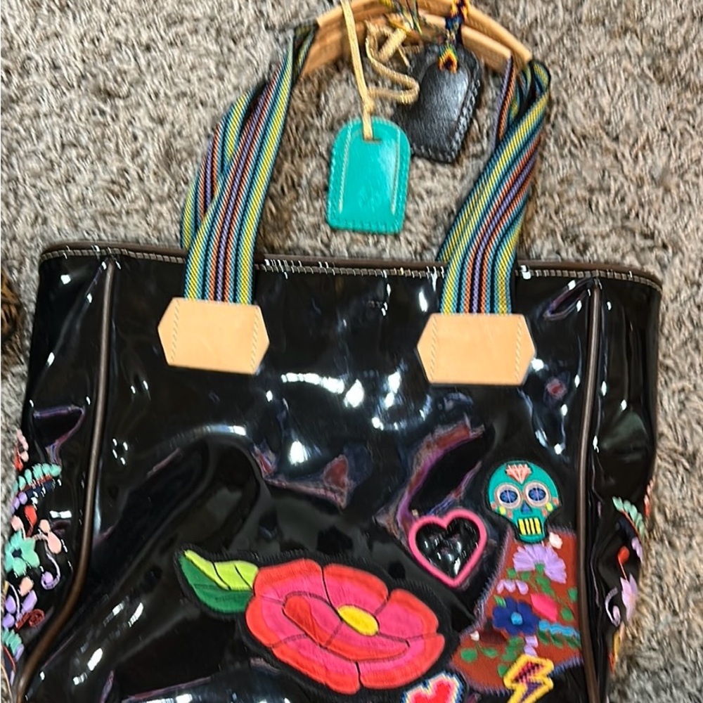 Black Glossy Tote with Vibrant Designs and Wooden Handles